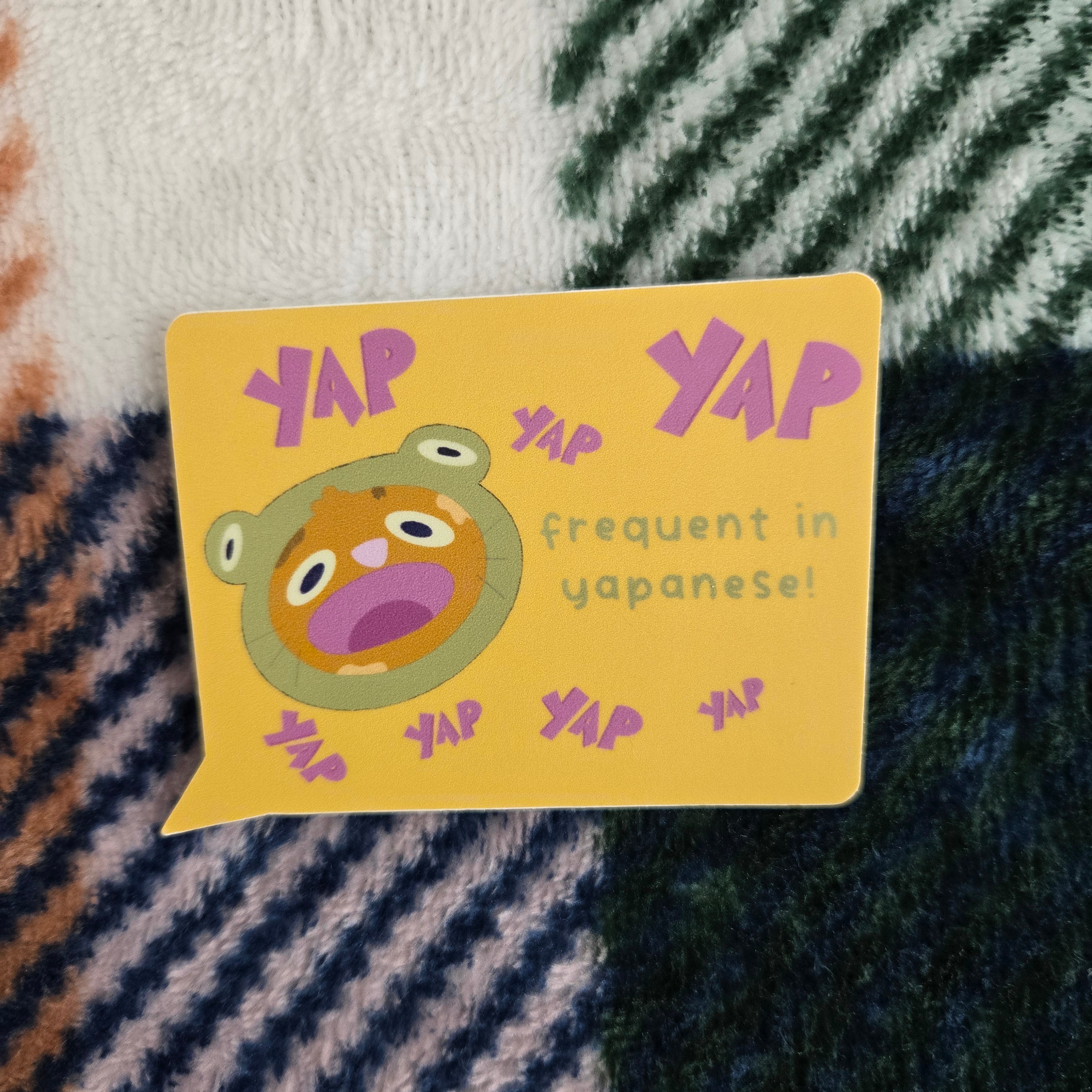 frequent in yapanese, loud cat in frog suit matte vinyl sticker