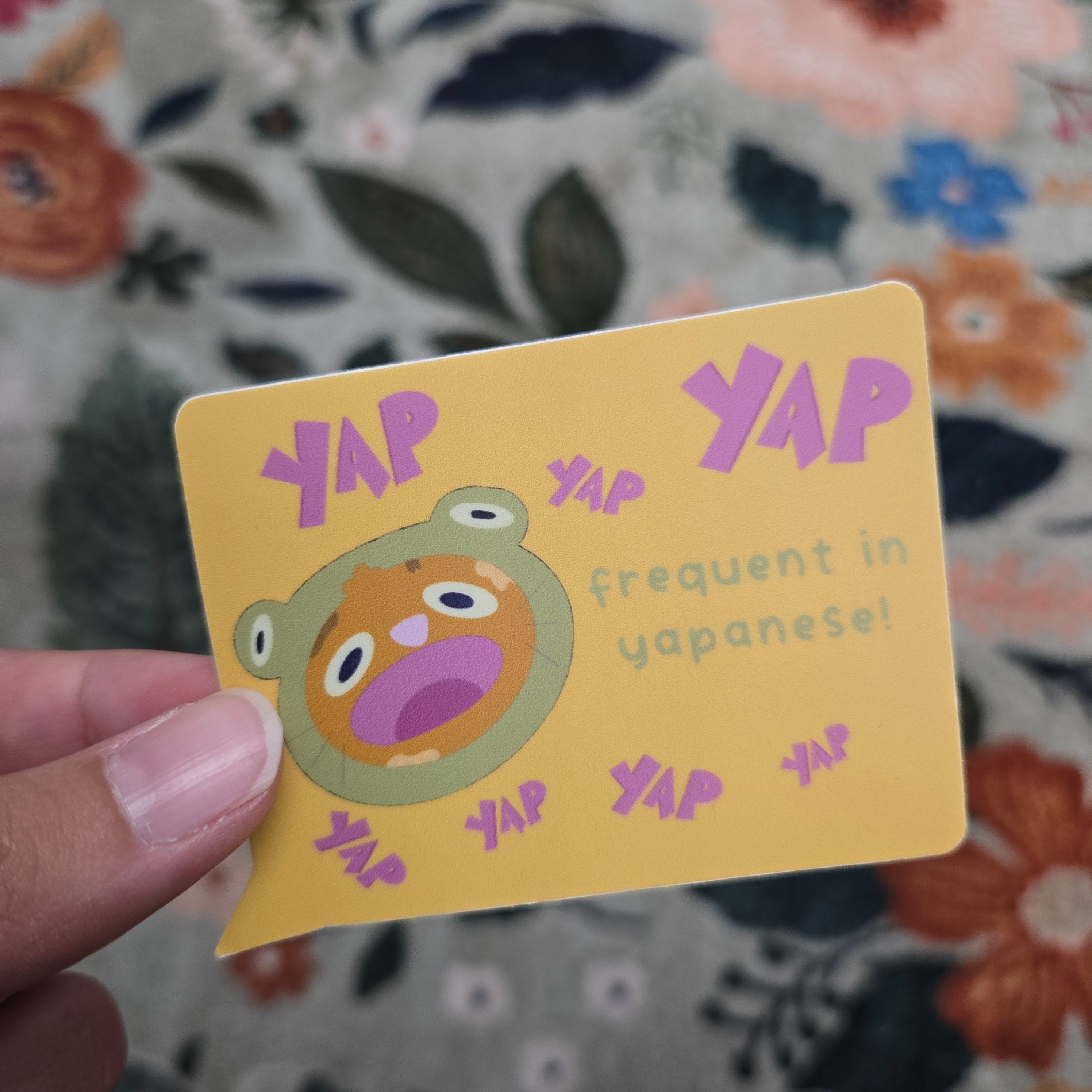 frequent in yapanese, loud cat in frog suit matte vinyl sticker