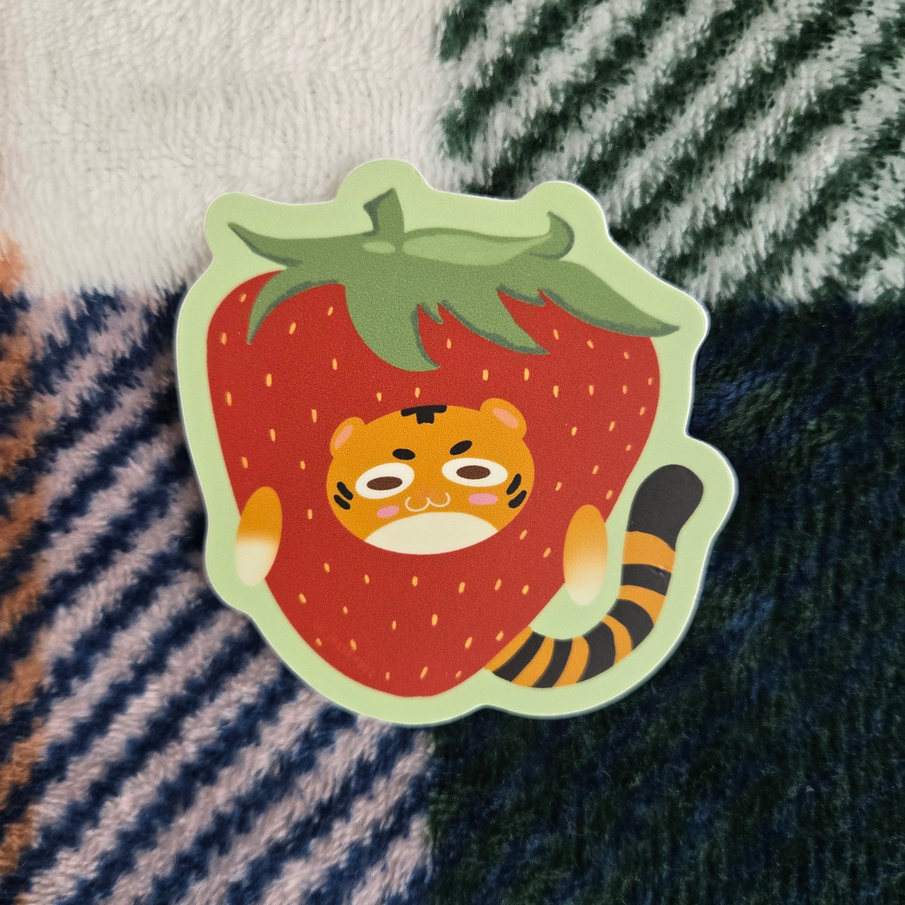 tiger stuck in a strawberry costume, matte vinyl sticker