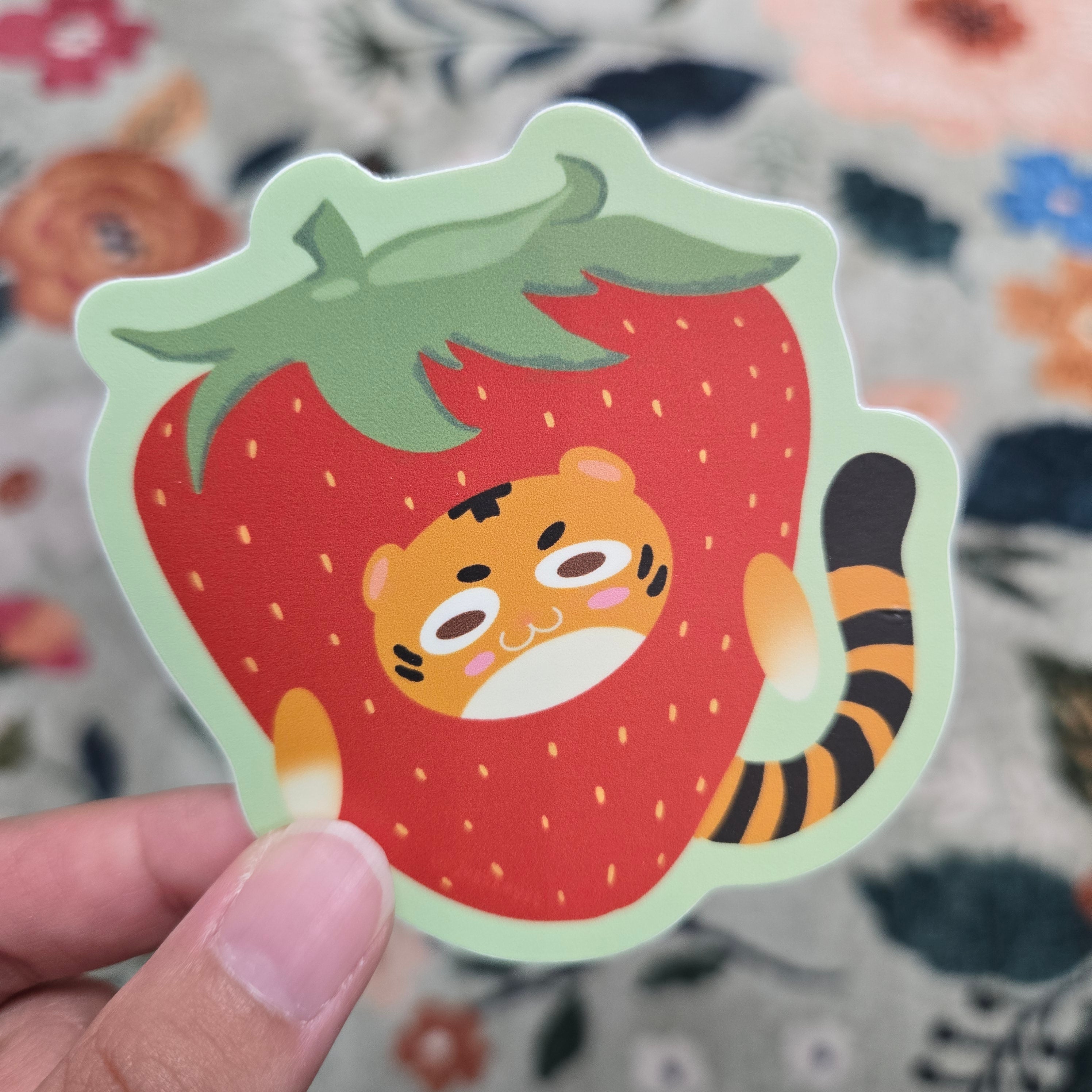 tiger stuck in a strawberry costume, matte vinyl sticker