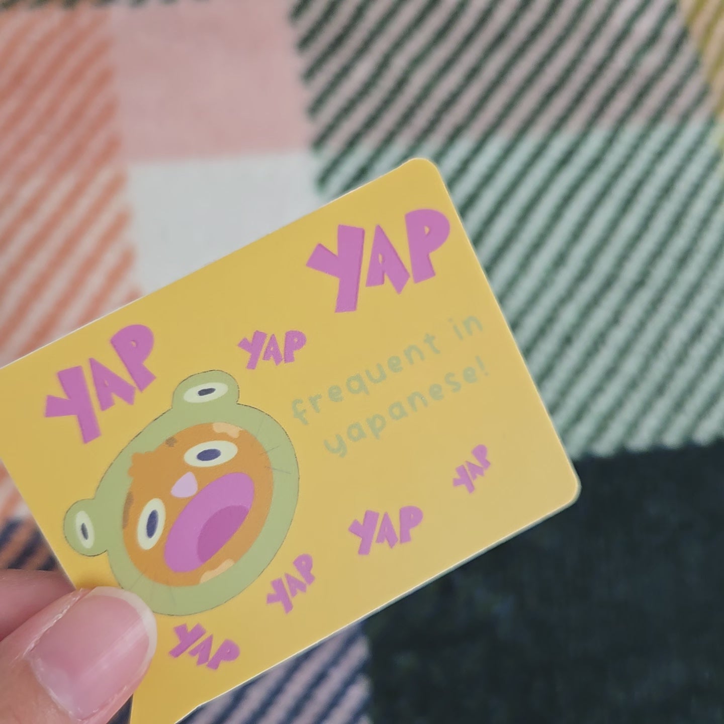 frequent in yapanese, loud cat in frog suit matte vinyl sticker