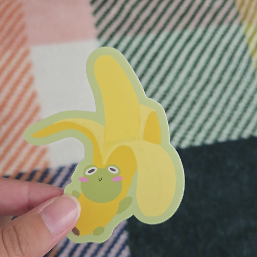 frog stuck in a banana costume, matte vinyl sticker